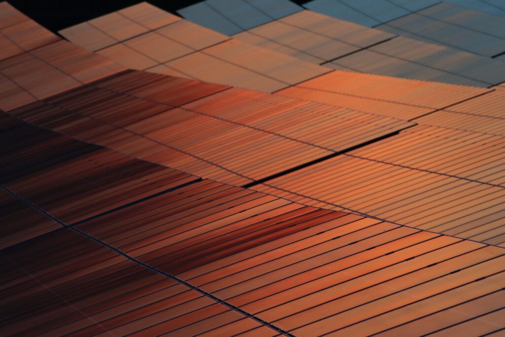 Photovoltaic solar panels reflecting the evening light